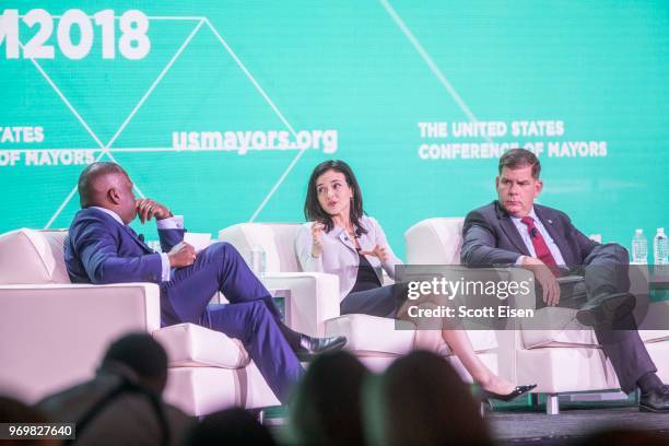 Steve Benjamin, mayor of Columbia, South Carolina, from left, Facebook COO Sheryl Sandberg and Marty Walsh, mayor of Boston during a session on how...