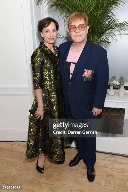 Kristin Scott Thomas and Sir Elton John attend the opening dinner for LFWM June 2018 at the Moët Summer House on June 8, 2018 in London, England.