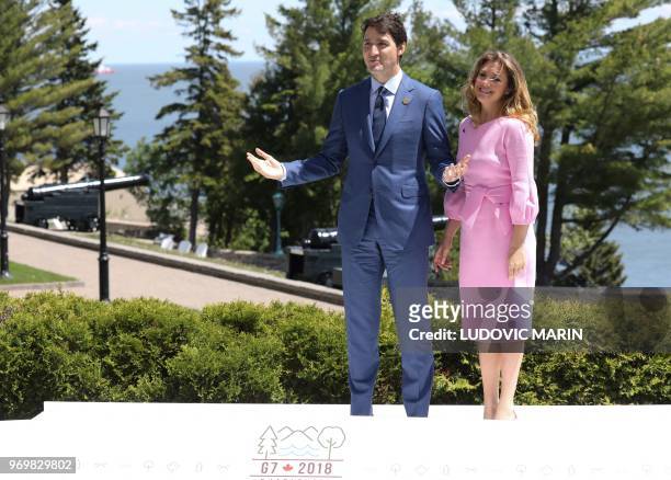 Canadian Prime Minister Justin Trudeau and his wife Sophie-Gregoire Trudeau wait at the official welcome ceremony of the G7 summit on June 8 in La...