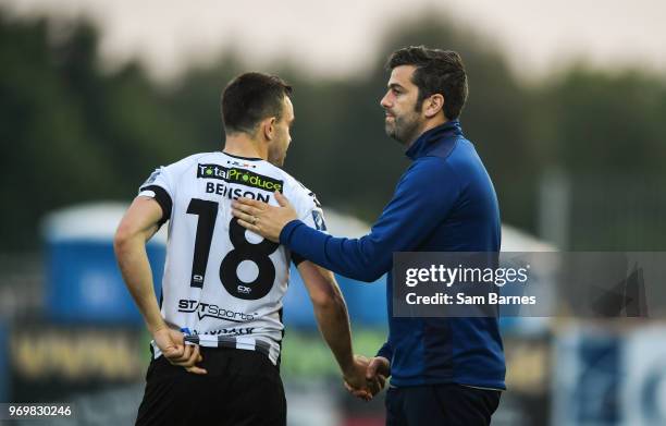 Dundalk , Ireland - 8 June 2018; Limerick manager Tommy Barrett, right, shakes hands with Robbie Benson of Dundalk following the SSE Airtricity...