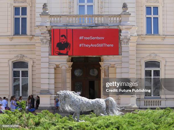 Banner in support of Ukrainian filmmaker Oleh Sentsov who is serving an illegal 20-year sentence in a Russian prison is seen on the facade of the...