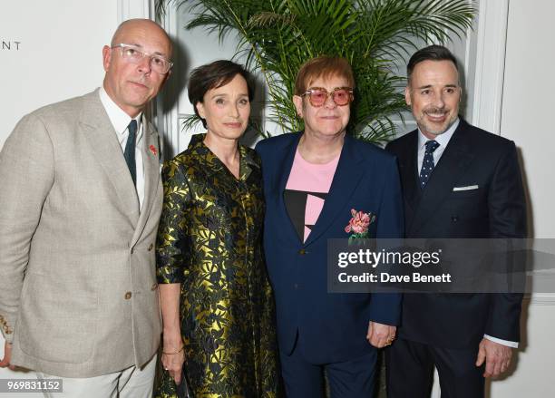 Dylan Jones, Dame Kristin Scott Thomas, Sir Elton John and David Furnish attend a VIP dinner celebrating the launch of London Fashion Week Men's June...