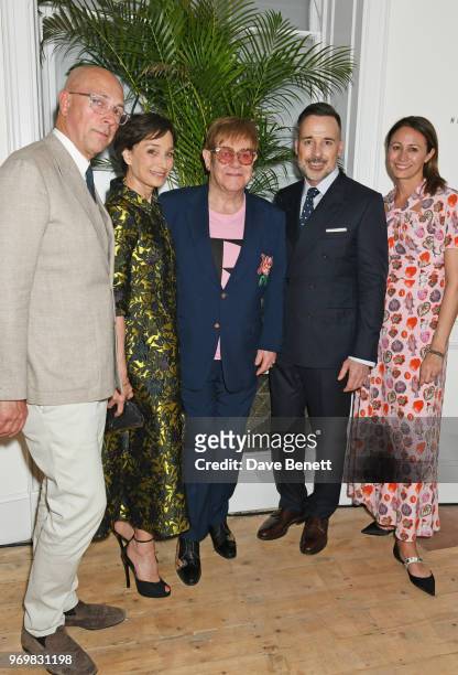 Dylan Jones, Dame Kristin Scott Thomas, Sir Elton John, David Furnish and Caroline Rush attend a VIP dinner celebrating the launch of London Fashion...