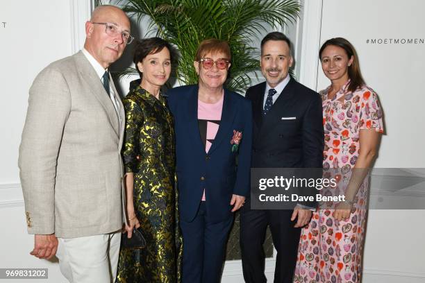 Dylan Jones, Dame Kristin Scott Thomas, Sir Elton John, David Furnish and Caroline Rush attend a VIP dinner celebrating the launch of London Fashion...