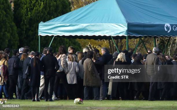 King Willem-Alexander of the Netherlands , along with friends and relatives, accompanies his wife Queen Maxima during the burial ceremony of her...