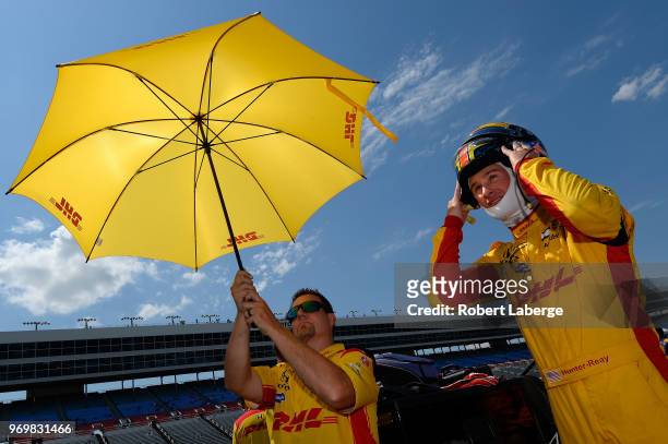 Ryan Hunter-Reay, driver of the DHL Honda, stands on the grid during the US Concrete Qualifying Day for the Verizon IndyCar Series DXC Technology 600...