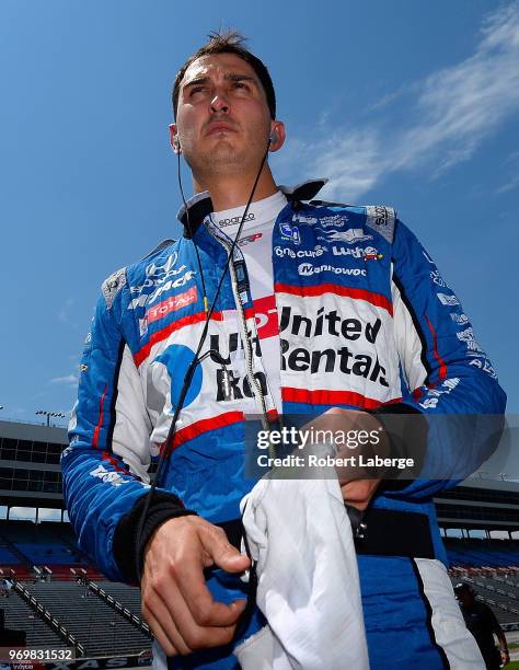 Graham Rahal, driver of the Fleet Cost & Care Honda, stands on the grid during the US Concrete Qualifying Day for the Verizon IndyCar Series DXC...