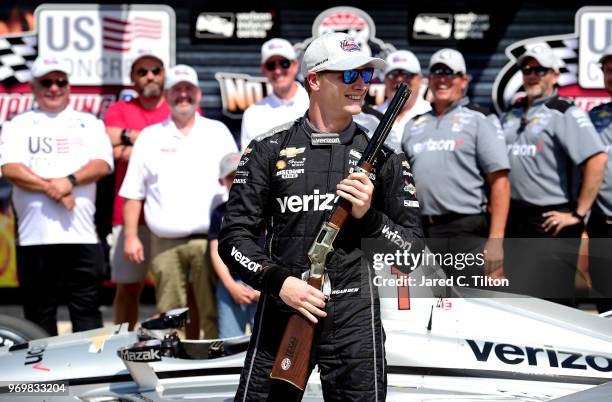 Josef Newgarden, driver of the Verizon Team Penske Chevrolet, poses for a photo after winning the pole award during the US Concrete Qualifying Day...