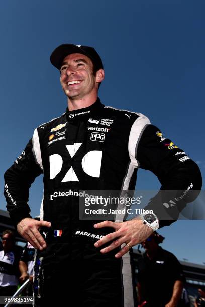 Simon Pagenaud, driver of the DXC Technology Team Penske Chevrolet, stands on the grid during the US Concrete Qualifying Day for the Verizon IndyCar...
