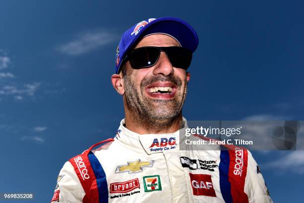 Tony Kanaan, driver of the ABC Supply AJ Foyt Racing Chevrolet, stands on the grid during the US Concrete Qualifying Day for the Verizon IndyCar...