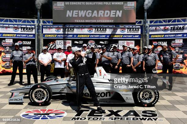 Josef Newgarden, driver of the Verizon Team Penske Chevrolet, poses for a photo after winning the pole award during the US Concrete Qualifying Day...