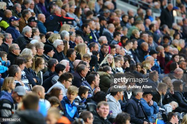 Fans of Hull FC look on during the Betfred Super League match between Hull FC and Salford Red Devils at KCOM Stadium on June 8, 2018 in Hull, England.