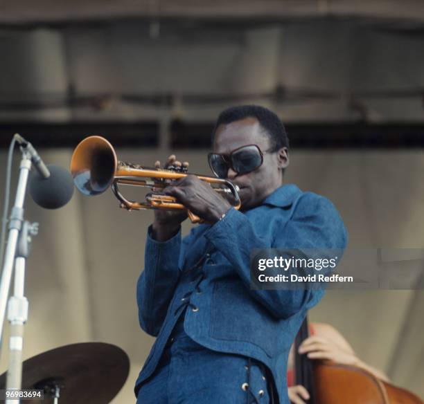 American trumpeter and composer Miles Davis performing live on stage at the Newport Jazz Festival at Newport, Rhode Island, 5th July 1969.