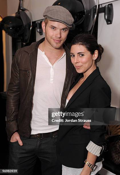 Actor Kellan Lutz and actress Jamie-Lynn Sigler pose at the Nine Zero One Salon Grand Opening and Book Party at Nine Zero One Salon on February 22,...