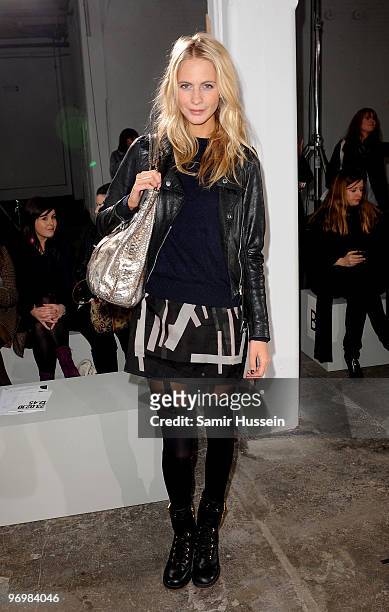 Poppy Delevingne attends the Jonathan Saunders London Fashion Week AutumnWinter 2010 show at the Old Truman Brewery on February 23, 2010 in London,...