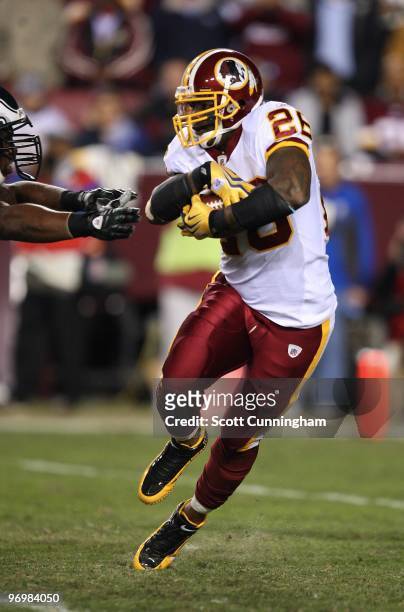 Clinton Portis of the Washington Redskins carries the ball against the Philadelphia Eagles at Fedex Field on October 26, 2009 in Landover, Maryland.