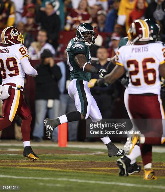 Will Witherspoon of the Philadelphia Eagles celebrates after returning an interception for a touchdown against the Washington Redskins at Fedex Field...