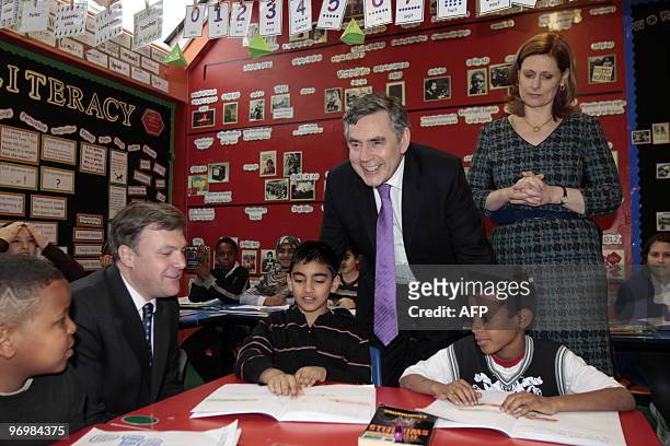 British Prime Minister Gordon Brown , his wife Sarah and Education minister Ed Balls visit a classroom at the Woodberry Down Community Primary School...