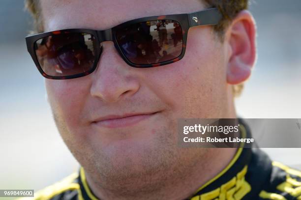 Cody Coughlin, driver of the JEGS.com Chevrolet, stands on the grid during the US Concrete Qualifying Day for the NASCAR Camping World Truck Series...