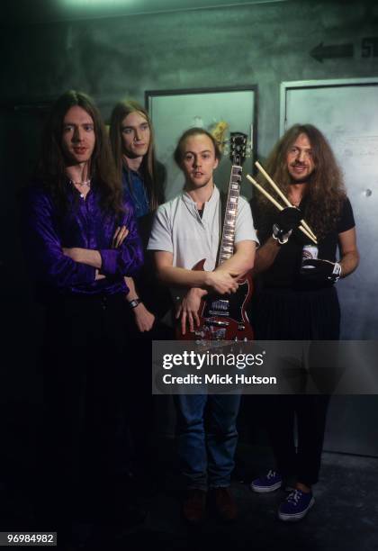 Group portrait of British metal band Cathedral. Left to right are Lee Dorrian, Leo Smee, Garry Jennings and Brian Dixon backstage in Japan in 1996