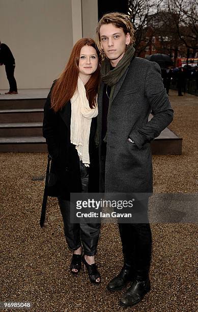 Actress Bonny Wright and Jamie Campbell Bower attend the Burberry Prorsum LFW Autumn/Winter 2010 Women�s wear show at the Parade Ground, Chelsea...
