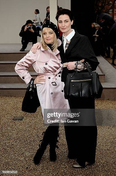 Models Twiggy and Erin O'Conner attends the Burberry Prorsum LFW Autumn/Winter 2010 Women�s wear show at the Parade Ground, Chelsea College of Art on...