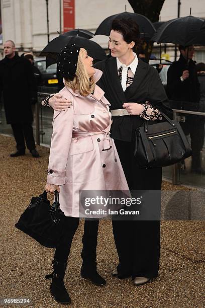 Models Twiggy and Erin O'Conner attends the Burberry Prorsum LFW Autumn/Winter 2010 Women�s wear show at the Parade Ground, Chelsea College of Art on...