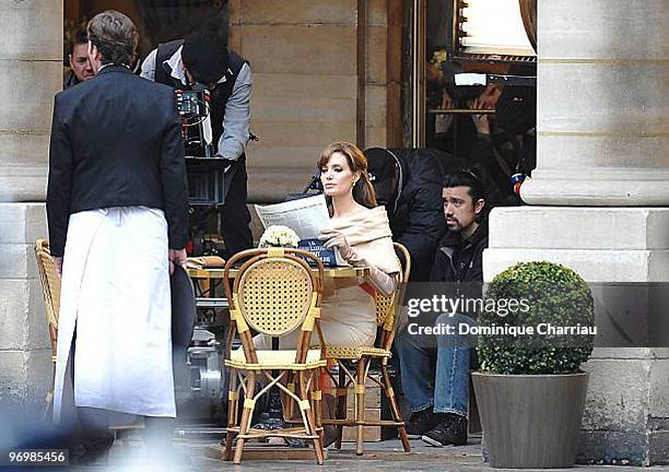 Actress Angelina Jolie films on location for "The Tourist" at Place Colette on February 23, 2010 in Paris, France.