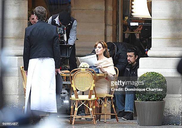 Actress Angelina Jolie films on location for "The Tourist" at Place Colette on February 23, 2010 in Paris, France.