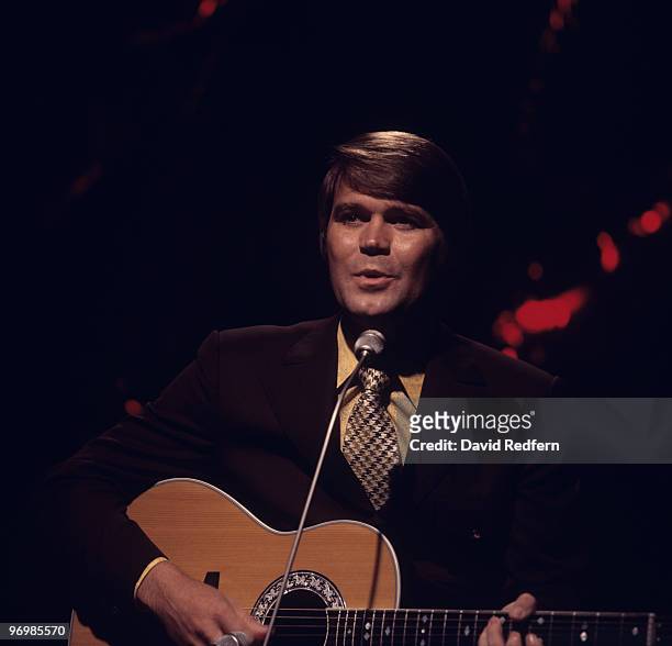 American singer Glen Campbell performs on a television show in the early 1970's.
