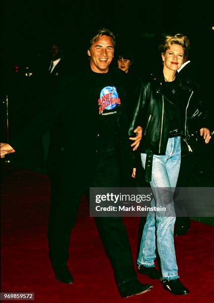 Don Johnson and Melanie Griffith arrive at the grand opening of the Planet Hollywood night club Washington, DC, October 3, 1993.