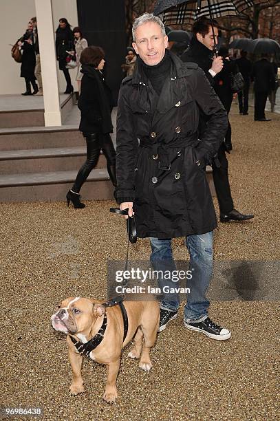 Designer Patrick Cox attends the Burberry Prorsum LFW Autumn/Winter 2010 Women�s wear show at the Parade Ground, Chelsea College of Art on February...