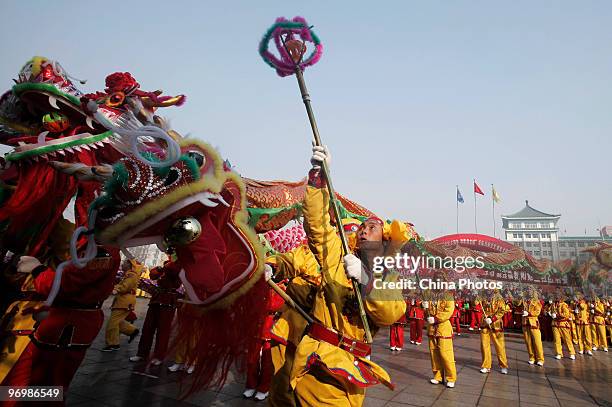 Folk artists perform Dragon Dance during a Folk Dragon Dance Contest which attracted about 40 teams, on February 23, 2010 in Taiyuan of Shanxi...