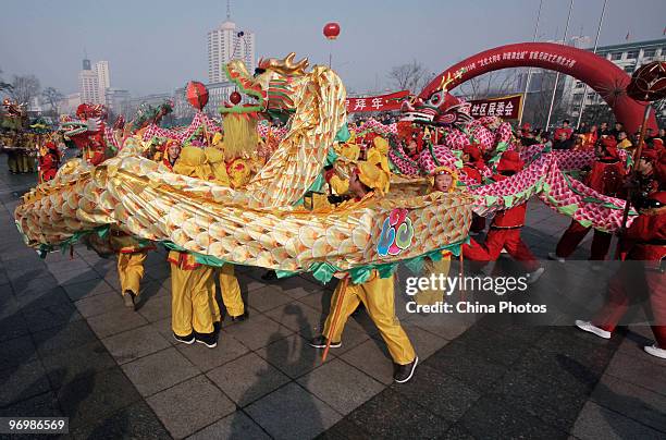 Folk artists perform Dragon Dance during a Folk Dragon Dance Contest which attracted about 40 teams, on February 23, 2010 in Taiyuan of Shanxi...