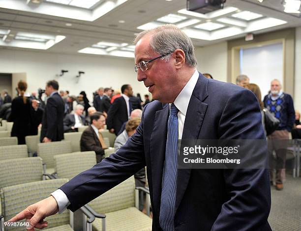 Paul Otellini, chief executive officer of Intel Corp., talks with an audience member following a speech at the Brookings Institution in Washington,...