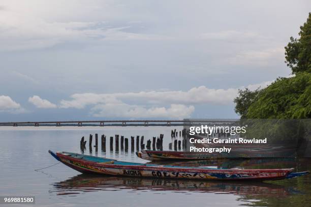 fishing boats on the river in senegal - senegal river photos et images de collection