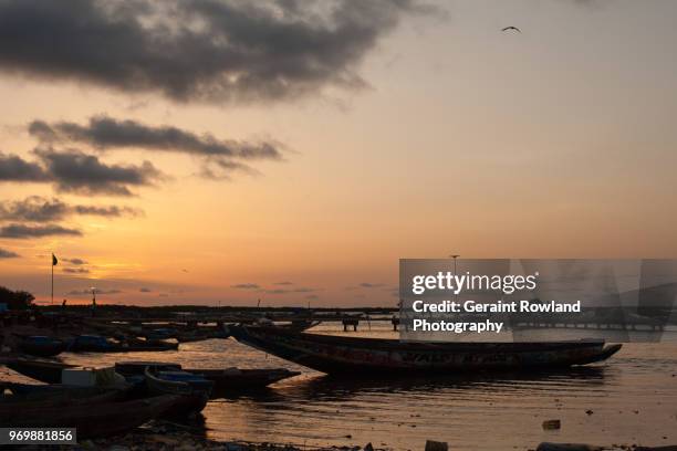 sunset on the river in the south of senegal - ziguinchor stock pictures, royalty-free photos & images