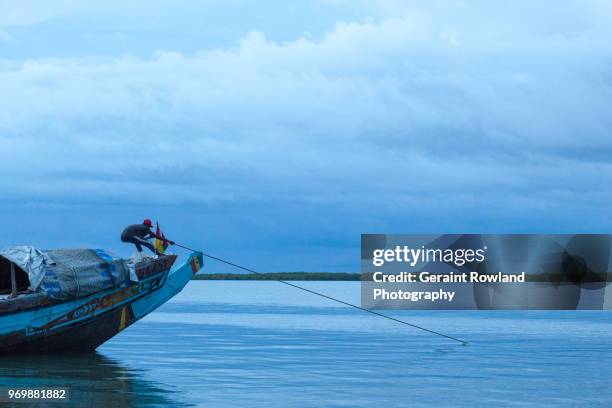 last light, down on the river, west africa - ziguinchor stock-fotos und bilder