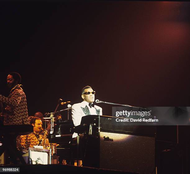 American singer, songwriter and pianist Ray Charles performs live on stage playing a Fender Rhodes electric piano at Carnegie Hall in New York during...