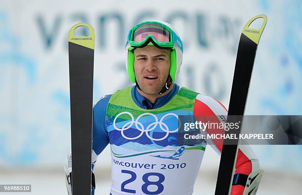S Jake Zamansky reacts in the finish area during the men's giant slalom race of the Vancouver 2010 Winter Olympics at the Whistler Creek side Alpine...