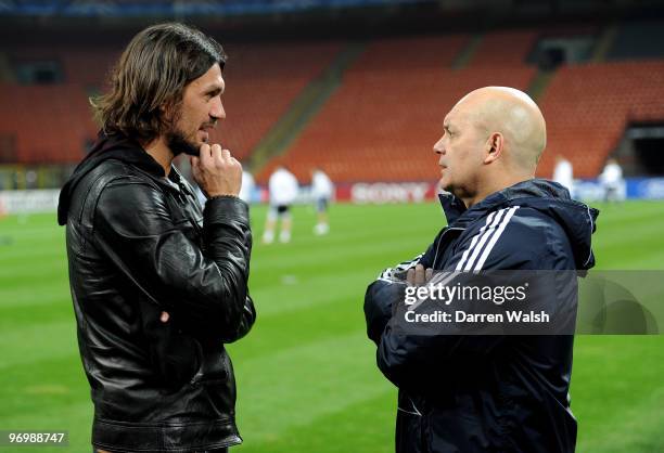 Paolo Maldini chats to Chelsea Assistant Manager Ray Wilkins during a training session on the day before the UEFA Champions League match between...