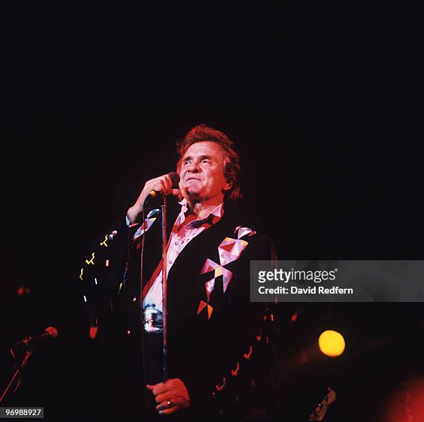 American singer Johnny Cash performs on stage at the Country Music Festival held in Peterborough, England on August 30, 1987.
