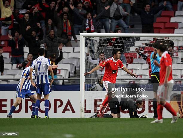 Oscar Cardozo of Benfica celebrates after scoring his team's fourth goal during the UEFA Europa League knock-out round, second leg match between SL...