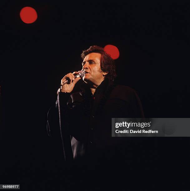 American singer Johnny Cash performs on stage at the Country Music Festival held in Portsmouth, England on August 10, 1980.
