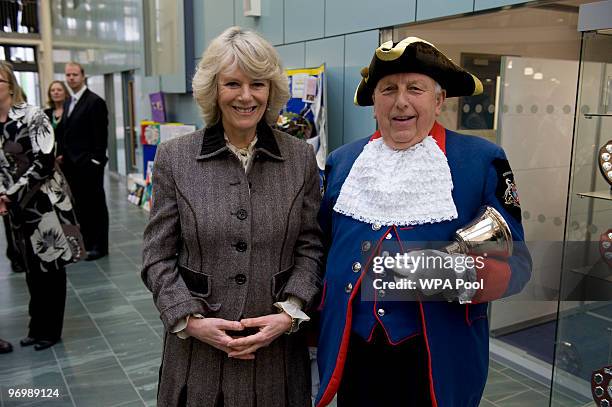 Camilla, Duchess of Cornwall meets with Alf Johnson the Town Crier of Marlborough during her visit to officially open the new St. John's School and...