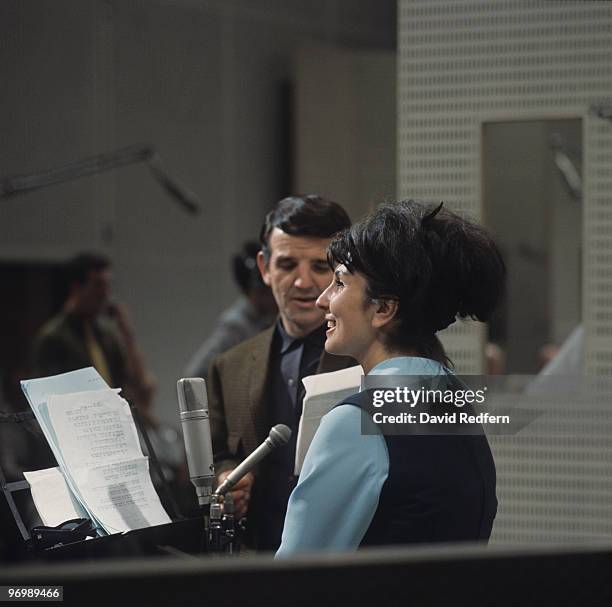 British singer Alma Cogan in a recording studio circa 1964.