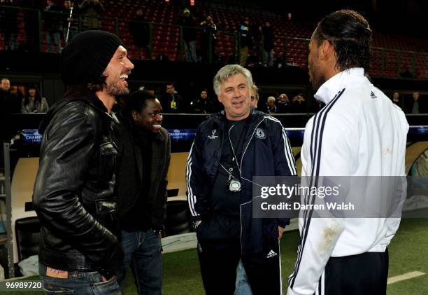 Paolo Maldini chats to Chelsea Manager Carlo Ancelotti and Didier Drogba during a training session on the day before the UEFA Champions League match...