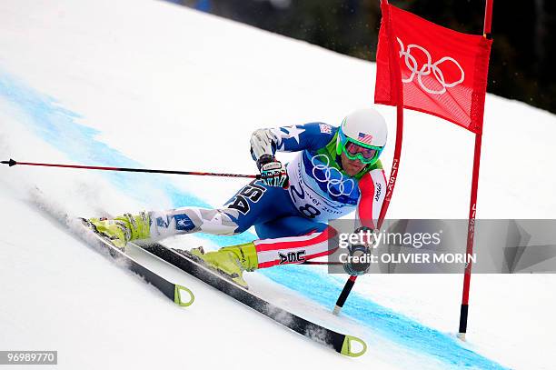 S Jake Zamansky clears a gate during the Men's Vancouver 2010 Winter Olympics Giant slalom event at Whistler Creek side Alpine skiing venue on...