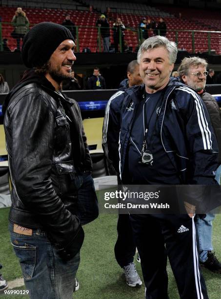 Paolo Maldini chats to Chelsea Manager Carlo Ancelotti during a training session on the day before the UEFA Champions League match between Inter...