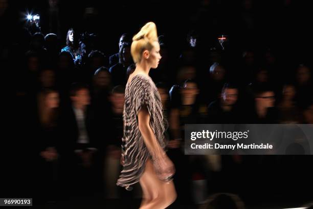 Model walks the runway at the Issa London show for London Fashion Week Autumn/Winter 2010 at Somerset House on February 23, 2010 in London, England.